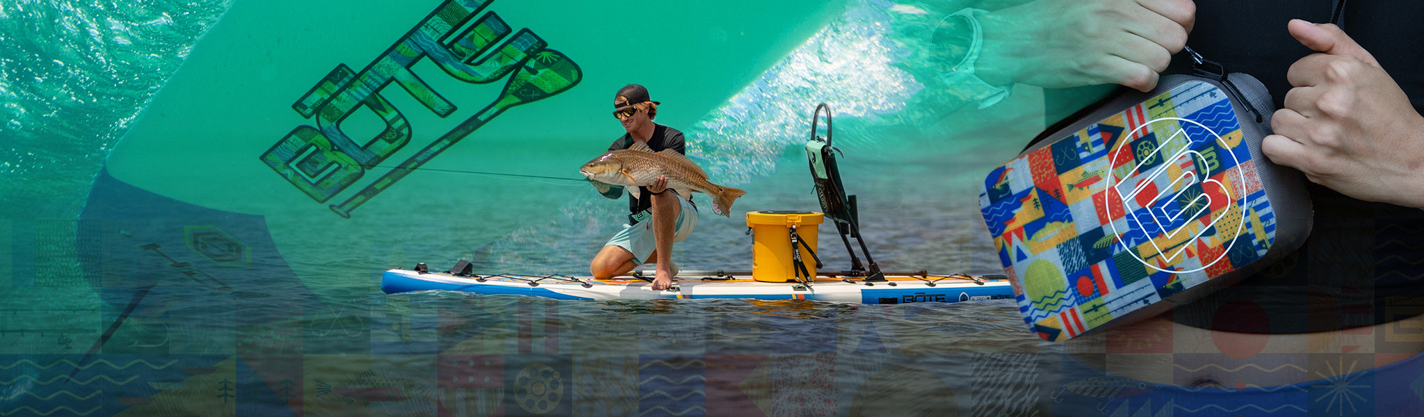 A guy holding up a redfish he caught on a Fischer Topwater paddle board
