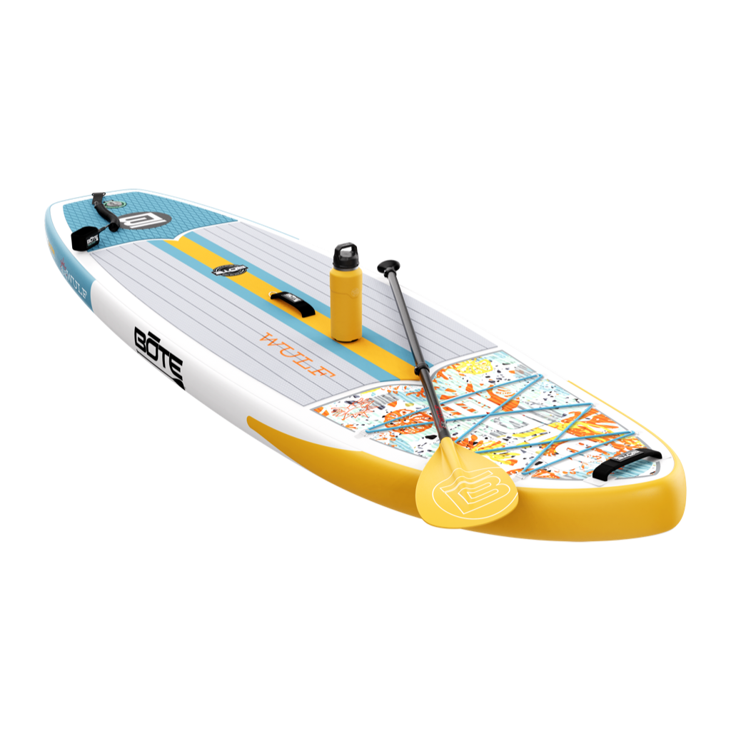 Front angled view of the WULF Aero 10'4" Native Coral Inflatable Paddle Board with bottle and paddle