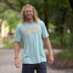 Image of a man wearing the Mens Box Logo Tee Shirt