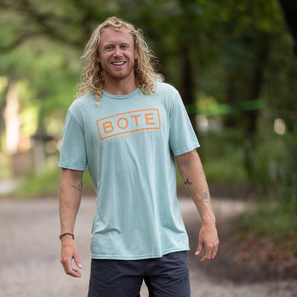 Image of a man wearing the Mens Box Logo Tee Shirt