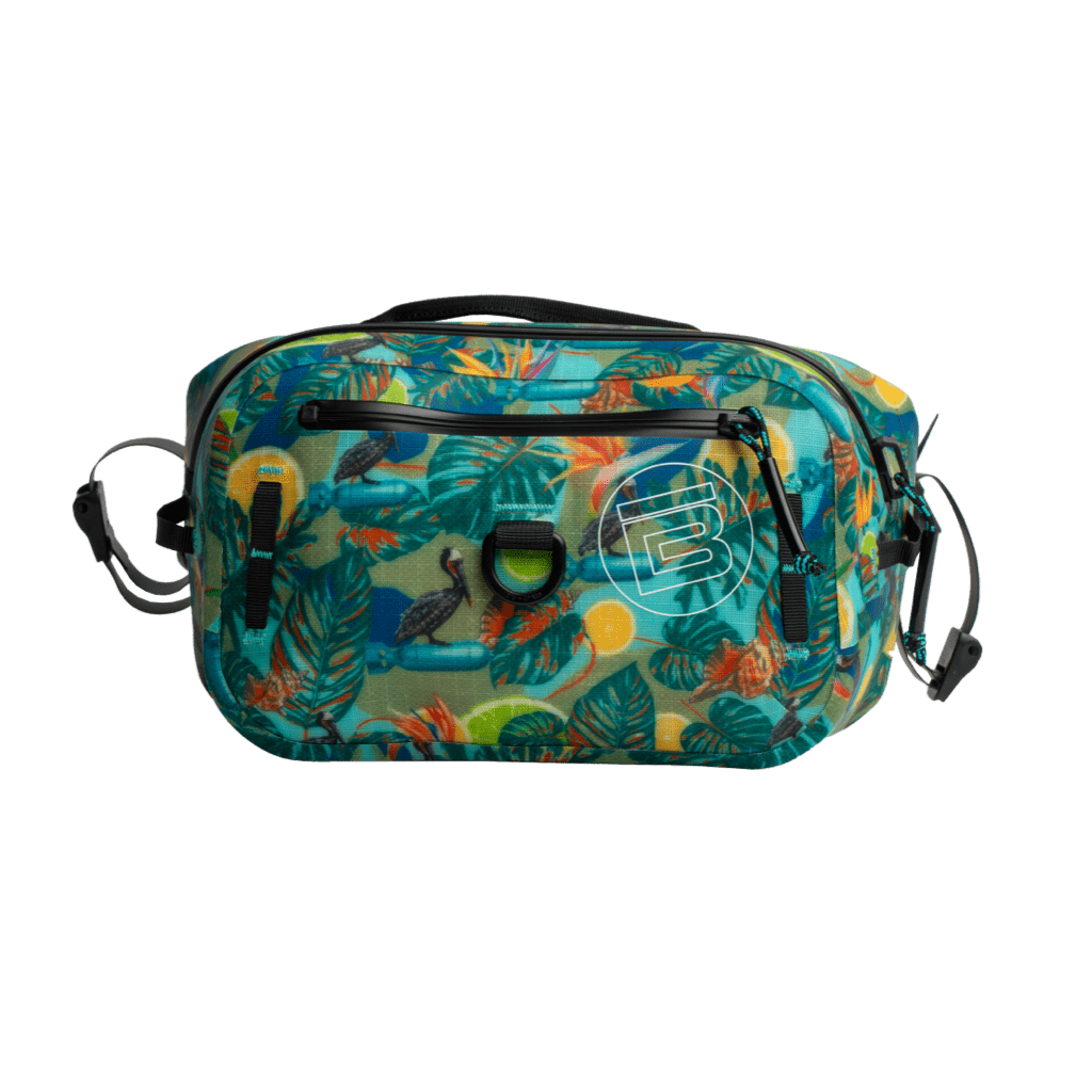 Front view of Native Bombardier belt pack with zip pocket, D-ring, and leaf and citrus print.