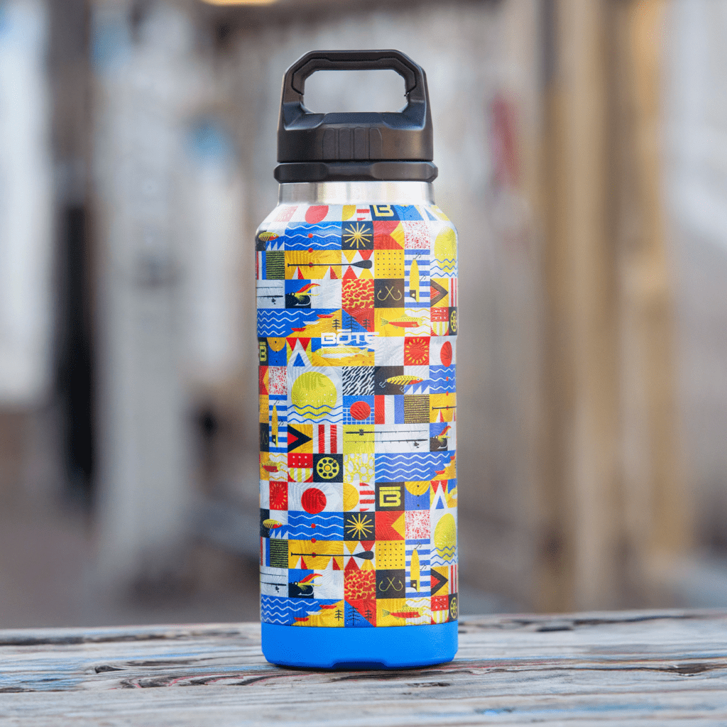 A MAGNEBottle 36oz with Cap Fischer Topwater on a table