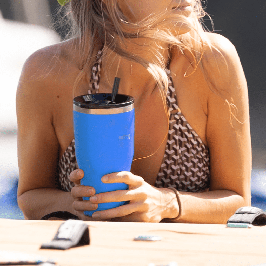 A girl holding a MAGNETumbler 32oz with Lid Harbor Blue