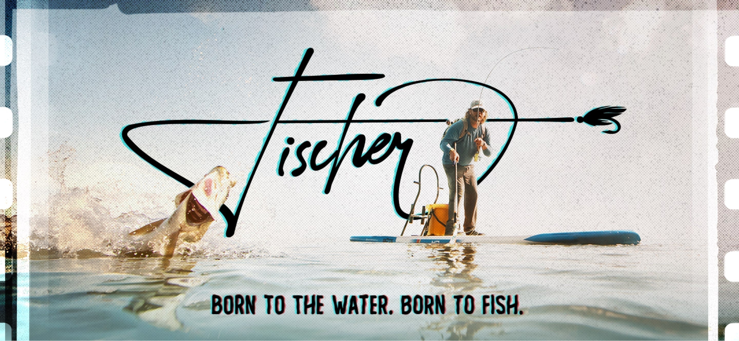 A paddle boarder realing in a fish off of his Fischer paddle board