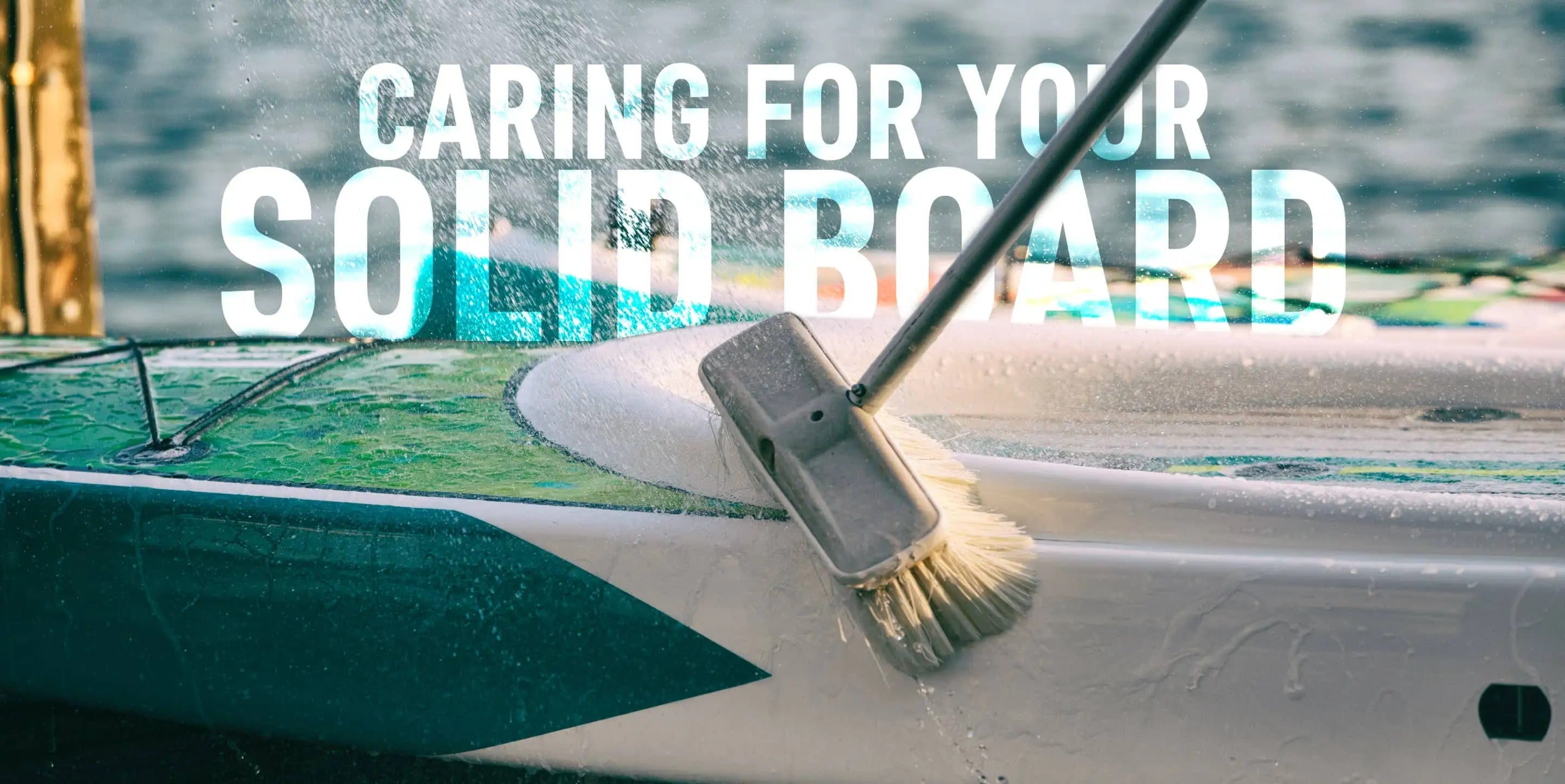 Someone is brushing their paddleboard to claen it with text saying "Caring for your solid board"