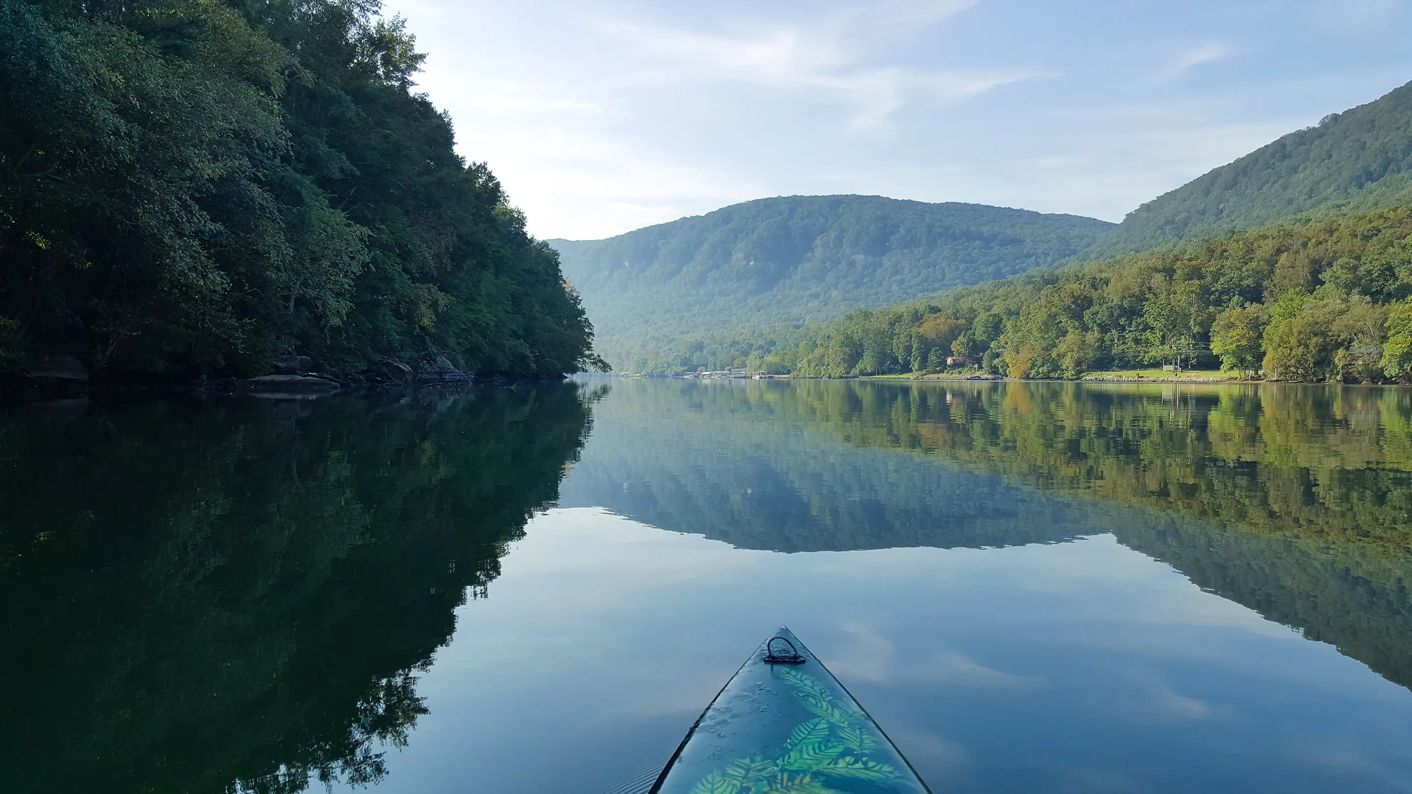 Front view of a paddler on the smooth water of the Clinch River