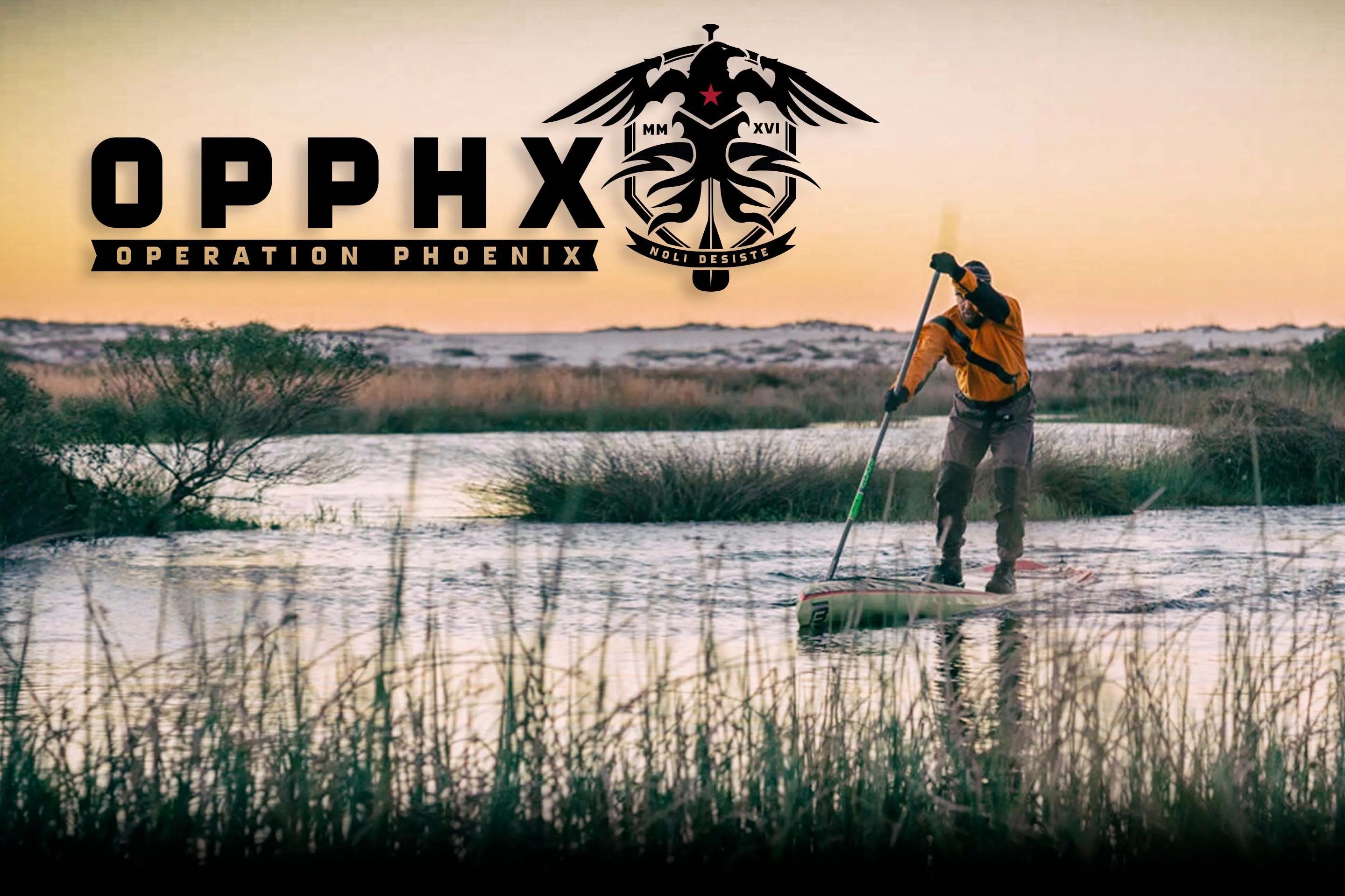 Solo paddler on calm water wearing orange with the sunset behind him. Text overlay says "OPPHX: Operation Phoenix" with their shield logo next to it