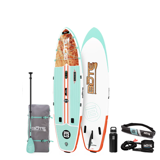 Top and base view of the 10'6" Breeze Aero Package in Classic Cedar with paddle, bag, bottle, pfd, and coiled leash.