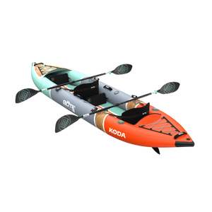 Rear angled view showing the orange stern of the Koda Aero Tandem with bungees and paddles.