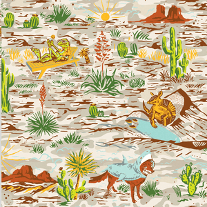 UltraTowel Native Sendero showing desert wildlife pattern with cactus, fox, armadillo, and sun illustrations.