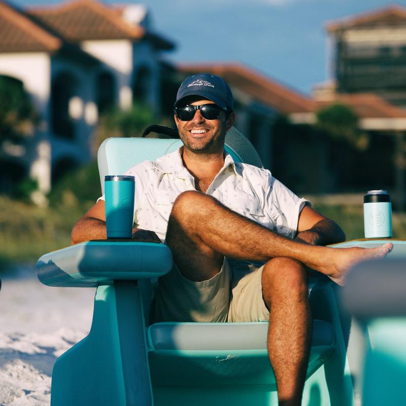A guy sitting in an AeroRondak chair