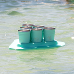 A BOTE Pong Classic seafoam set floating in the water