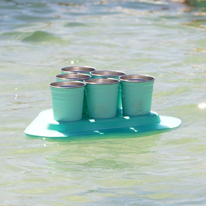 A BOTE Pong Classic seafoam set floating in the water