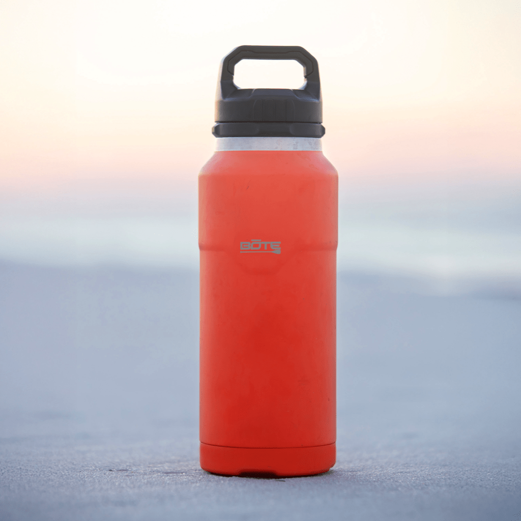 A detailed image of the MAGNEBottle 36oz with Cap Sunrise, showing its design and key features.