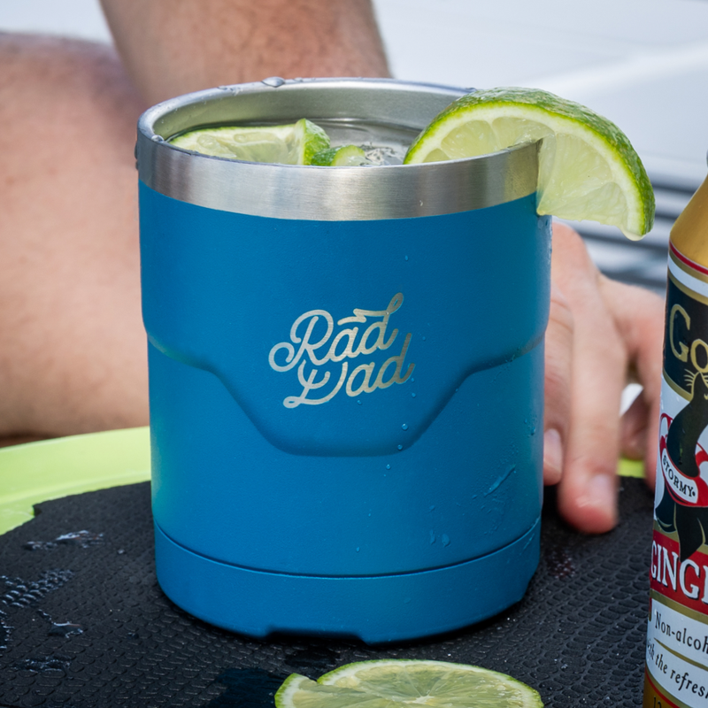 A drink in the Rad Dad Limited Edition Lowball on top of a KULA cooler