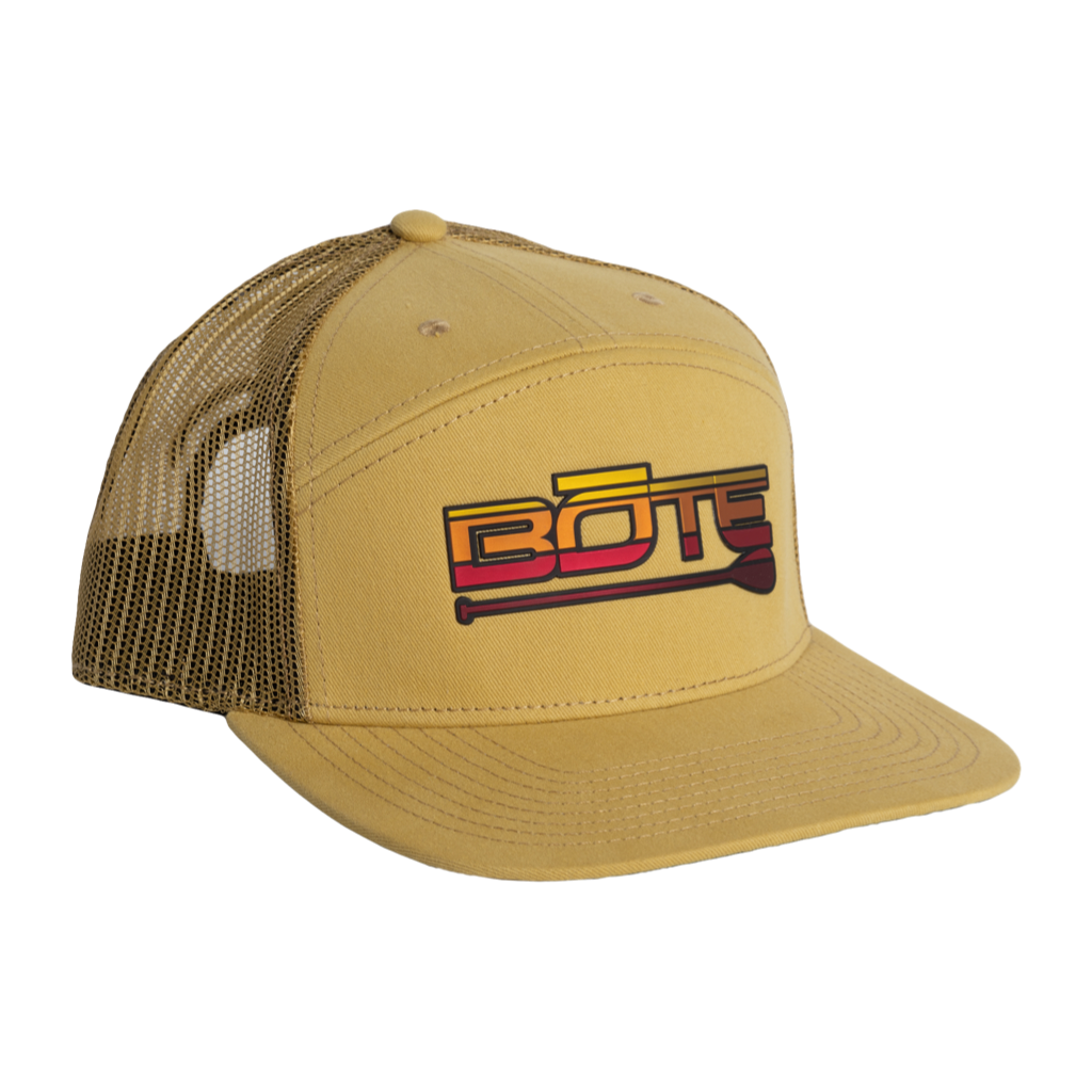 Front view of the BOTE Desert Logo 7 Panel Hat in Yellow. Featuring a yellow, orange, and red BOTE logo.