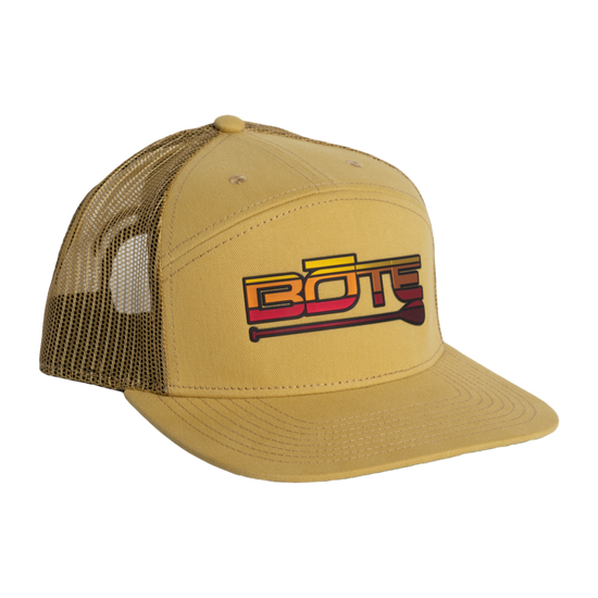 Front view of the BOTE Desert Logo 7 Panel Hat in Yellow. Featuring a yellow, orange, and red BOTE logo.