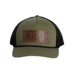 Front view of the BOTE Boxed Logo Hat with brown Patch in dark green.