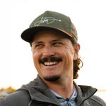 A guy wearing a BOTE Fischer Snapback Hat