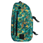 Front view of Highwater Slingpack Native Bombardier with bold B logo and tropical print.