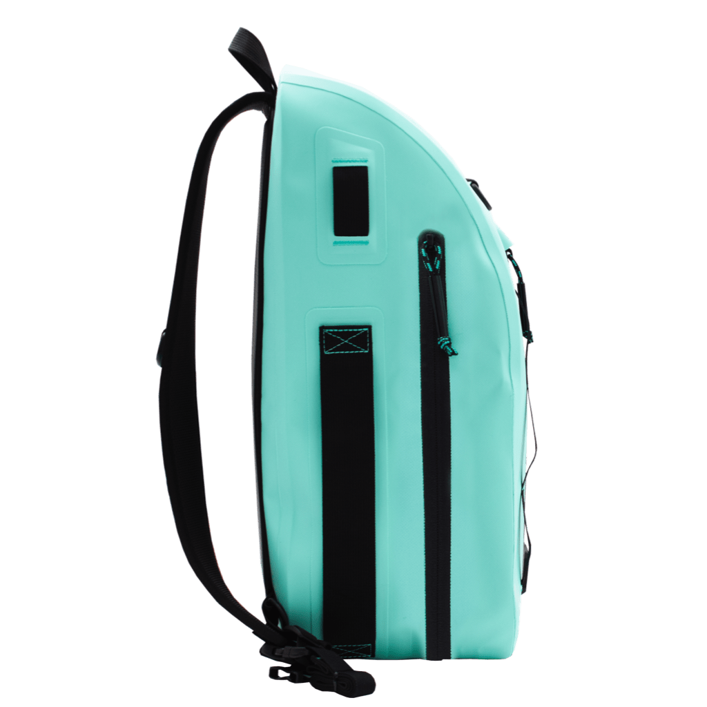 Side view showing zippered pocket and black gear straps on the Highwater Slingpack Seafoam.