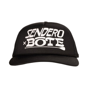 Front view of BOTE Sendero Trucker Hat in Black with a white BOTE logo.