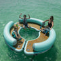 A mom and kids hanging out on the Inflatable Dock Hangout 360 Trio