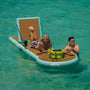 A man and woman hanging out on the Inflatable Hangout Lounge Bar Solo in the water