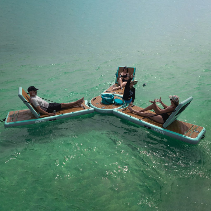 People lounging on the Inflatable Hangout Lounge Bar Trio