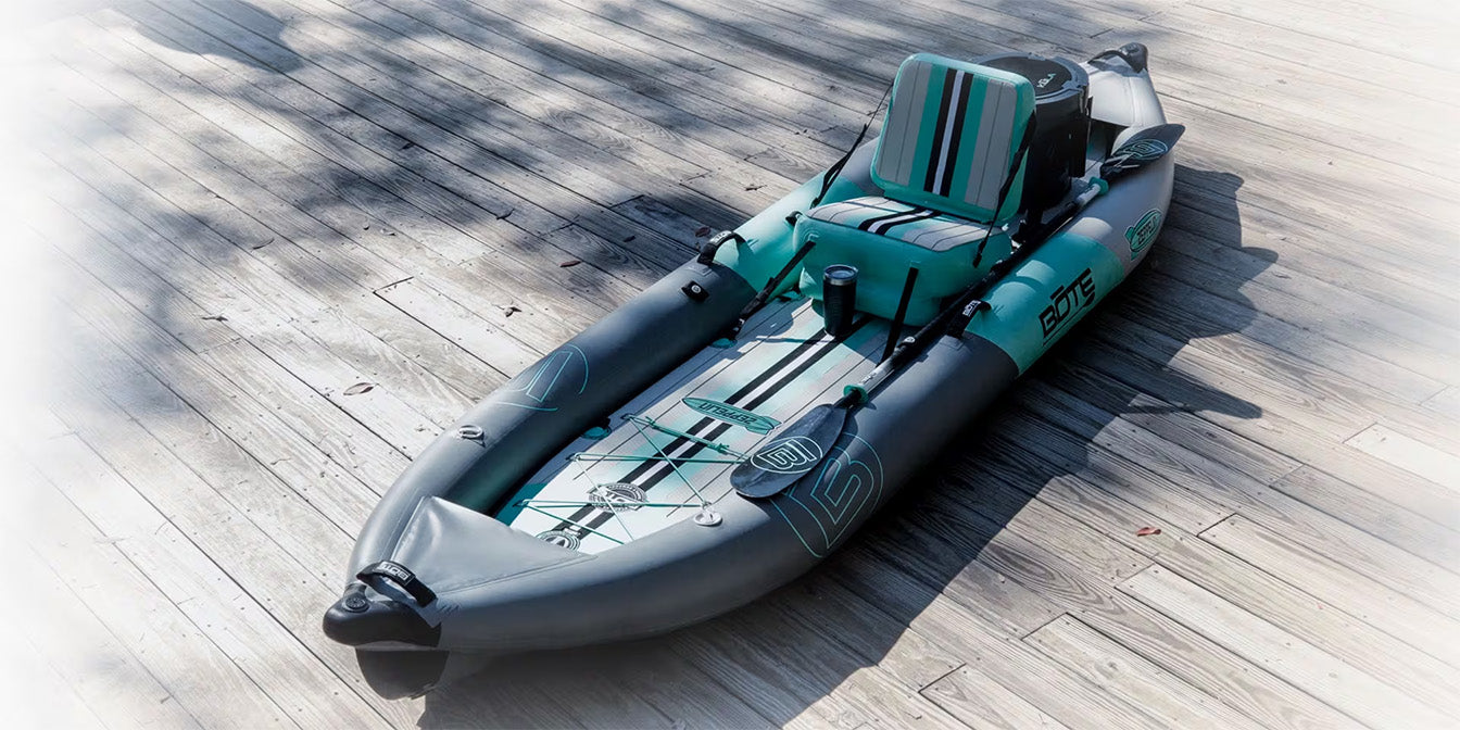 Angled view of Zeppelin Aero Tandem inflatable kayak on wooden dock in sunlight.