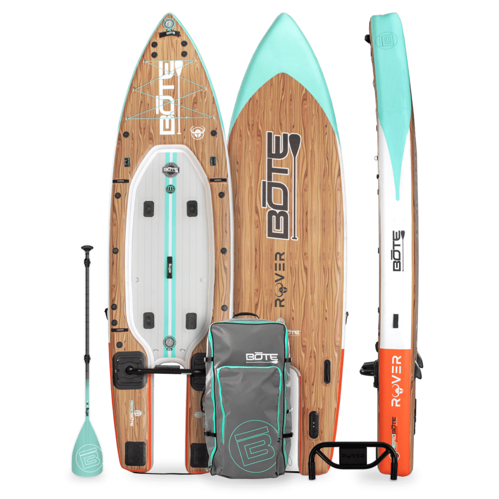 Gear layout of Rover Aero Classic Cypress Micro Skiff with paddle, board, and roller bag.