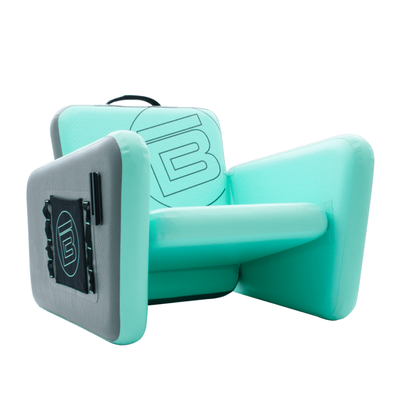 Angled view of the inflatable Aero Chair with stretch pocket, MOLLE loops and cup holder receiver