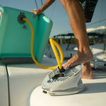 Man using foot pump to inflate an Aero Chair