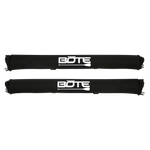 Two black roof rack pads with white BOTE logo