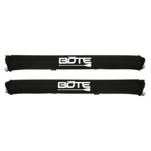 Two black roof rack pads with white BOTE logo