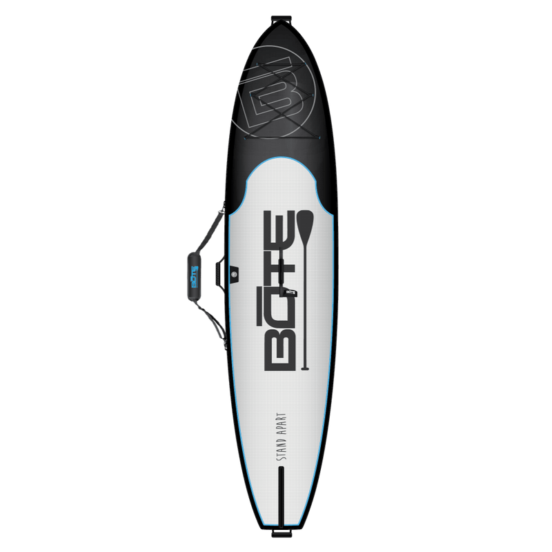 Front of a board bag including extra strap to hold paddle