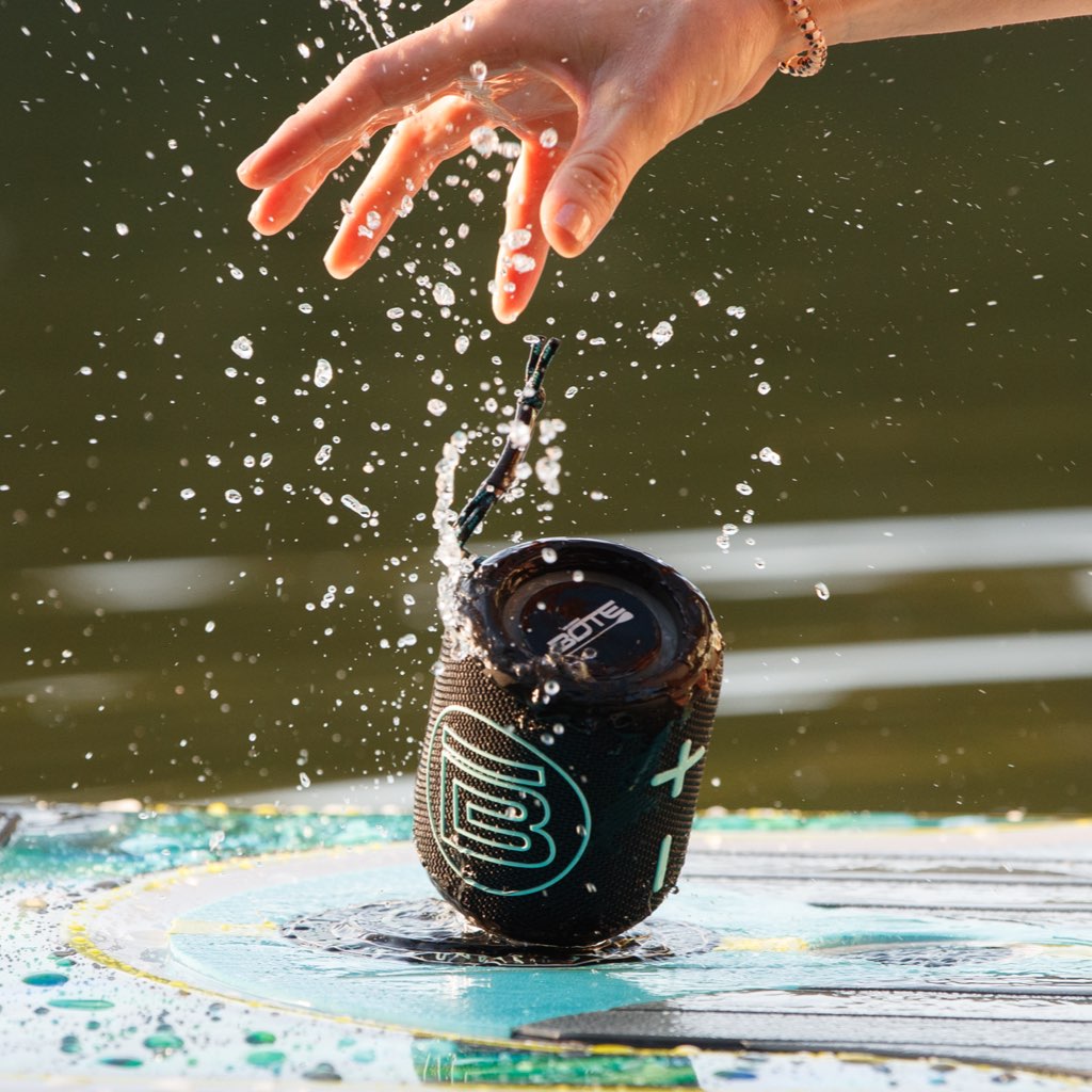 Side image of speaker falling on water