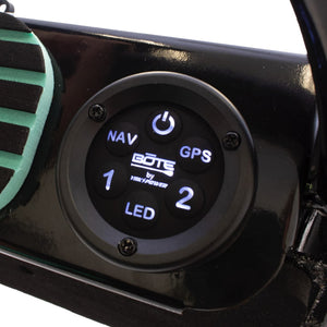 Close-up of Power Rac control panel with backlit buttons labeled GPS, NAV, LED, and power.