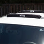 Quick Strap Board Rack on top of a sedan that does not have roof racks installed.