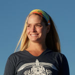 Woman wearing Native Patchwork Face Mask as a headband