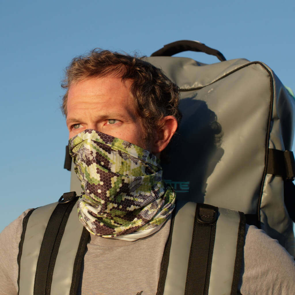Man wearing Verge Camo face mask over his nose and mouth