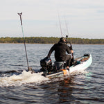 Man using a 6hp Hidea Outboard motor to power his Rover Aero Micro Skiff